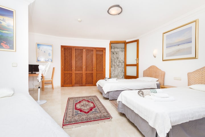 The middle bedroom has a double bed and a single bed.  It now has it's own ensuite too as we converted the unused internal jacuzzi into a lovely ensuite. So all 3 bedrooms now have their own ensuite.