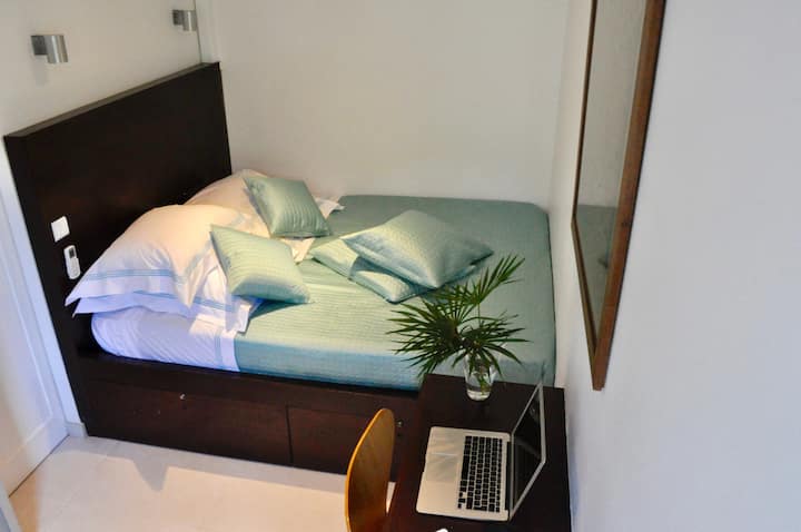 The bedroom with lovely bedding by Signoria Florence