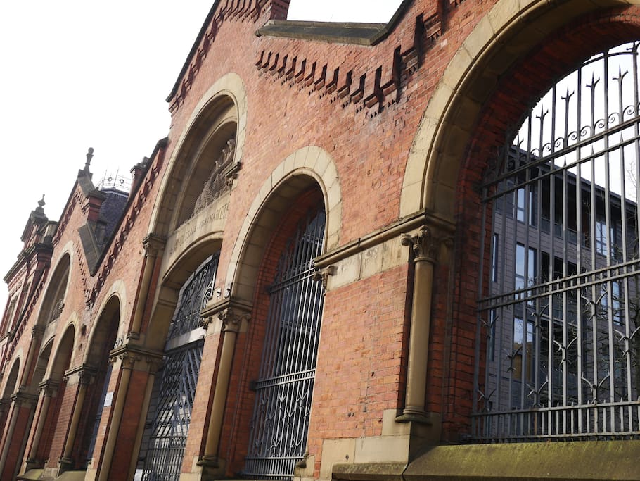 The side/back gate to the building and shared courtyard space.
