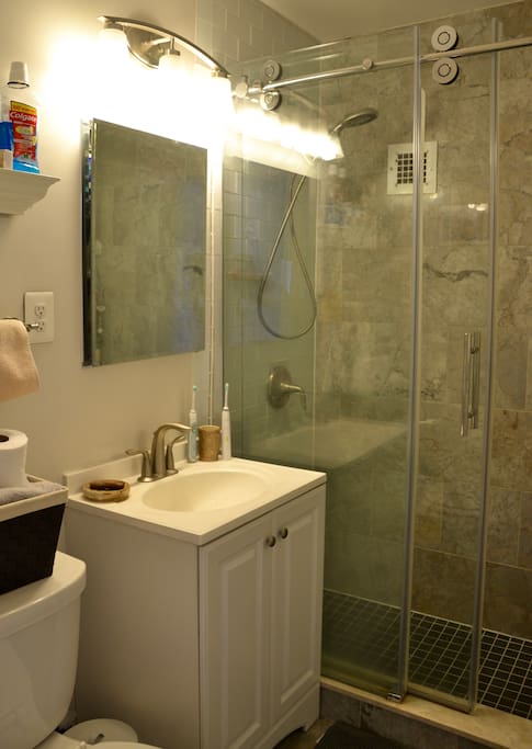 Luxury bathroom with slate and marble tiles