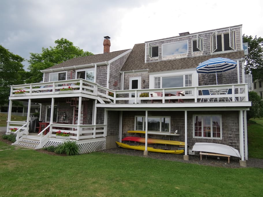 Multiple decks. Kayaks, Paddleboard, row boat for guest use. (free)