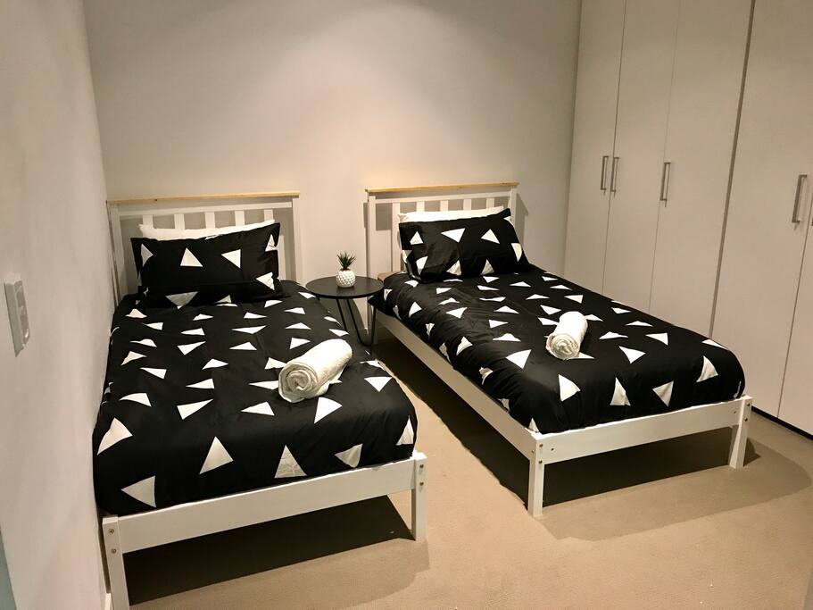 First bedroom has 2 single beds ( another picture with different sheets)