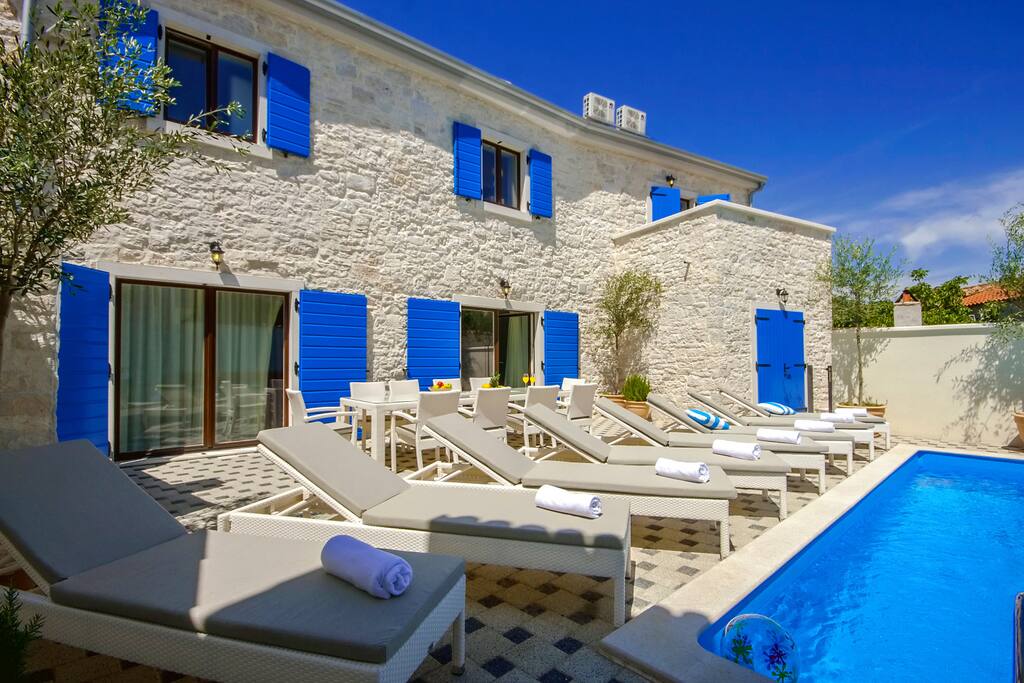 Sun chairs at the swimming pool