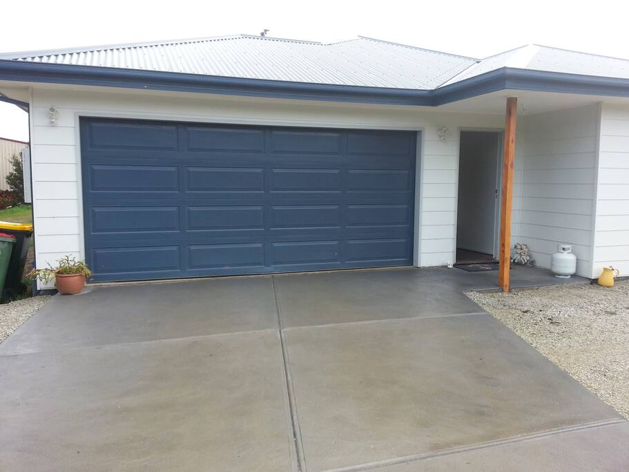 Driveway and garage at front of house