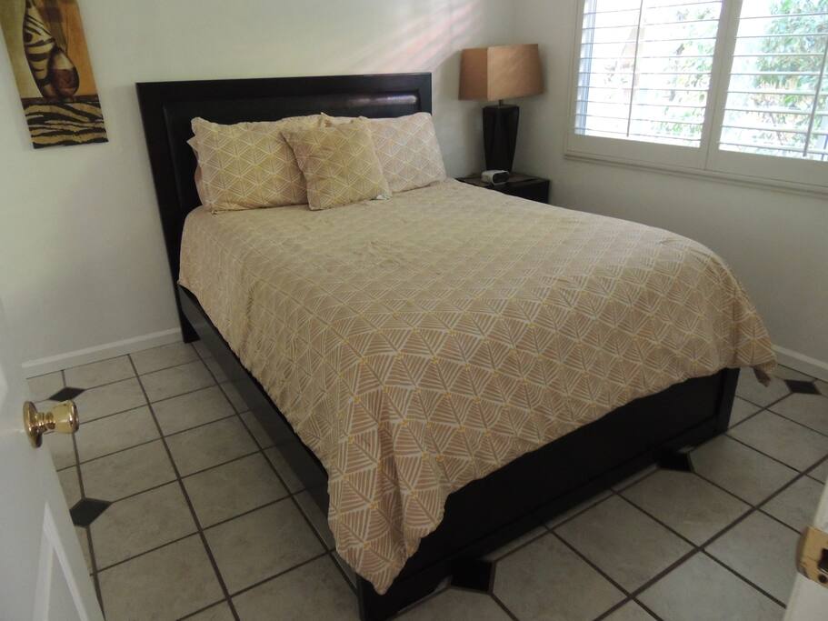 One of three Queen beds