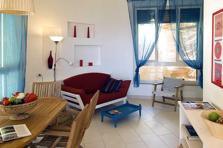 მისაღები ოთახი ერთადგილიანი გასაშლელი დივნით