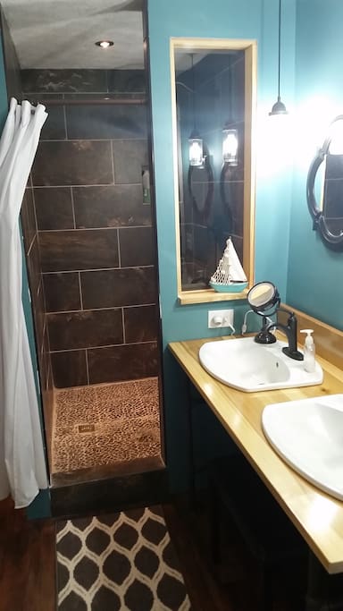 Double vanity with huge walk-in tile shower. Newly renovated.