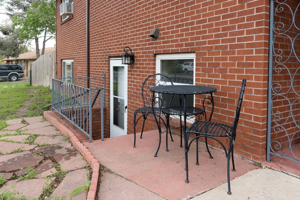 Wrought iron table and chairs. Please use them if you'd like to.