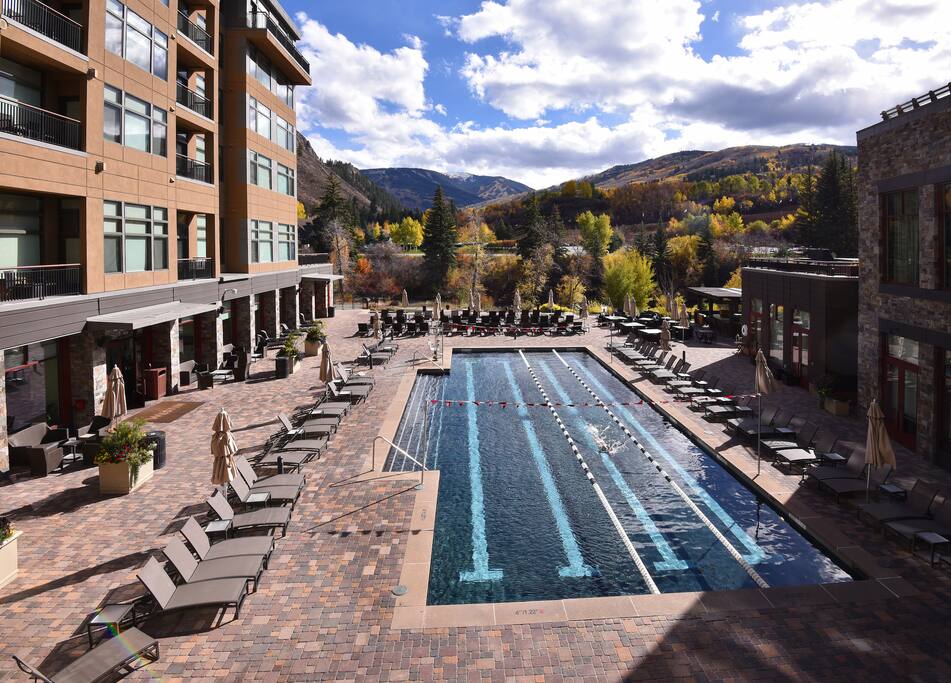 View from your living room window. 25 meter saline pool, Eagle River, and Beaver Creek Mountain in the background