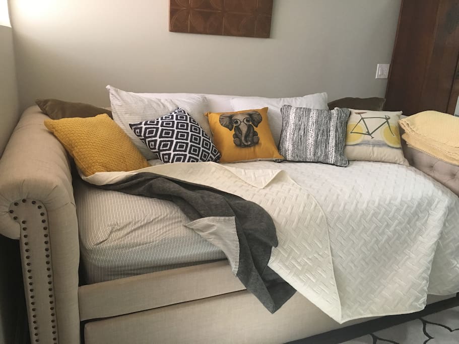 This couch is really a bed. A full size mattress sits inside a tufted couch frame. Enjoy sitting and watching television and for sleeping.
