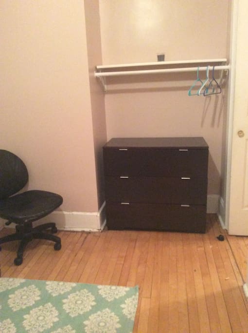This is the closet with a set a drawers and a desk chair. Working on getting a desk soon!