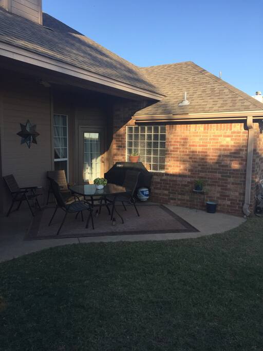 Back patio with gas grill.