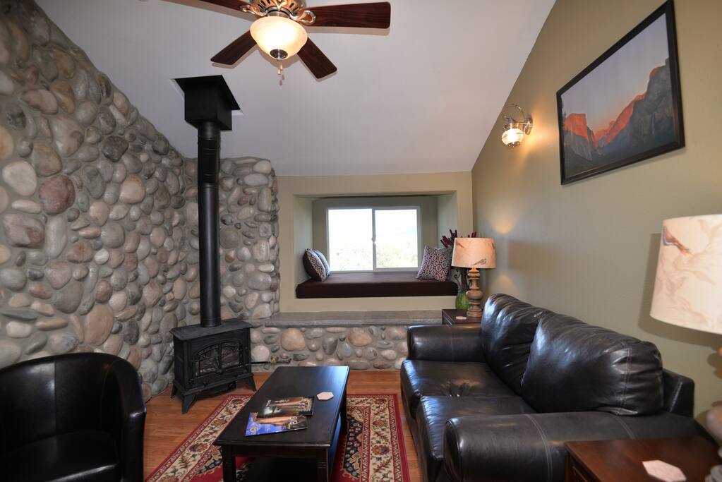 Sitting area gas fireplace and window day bed