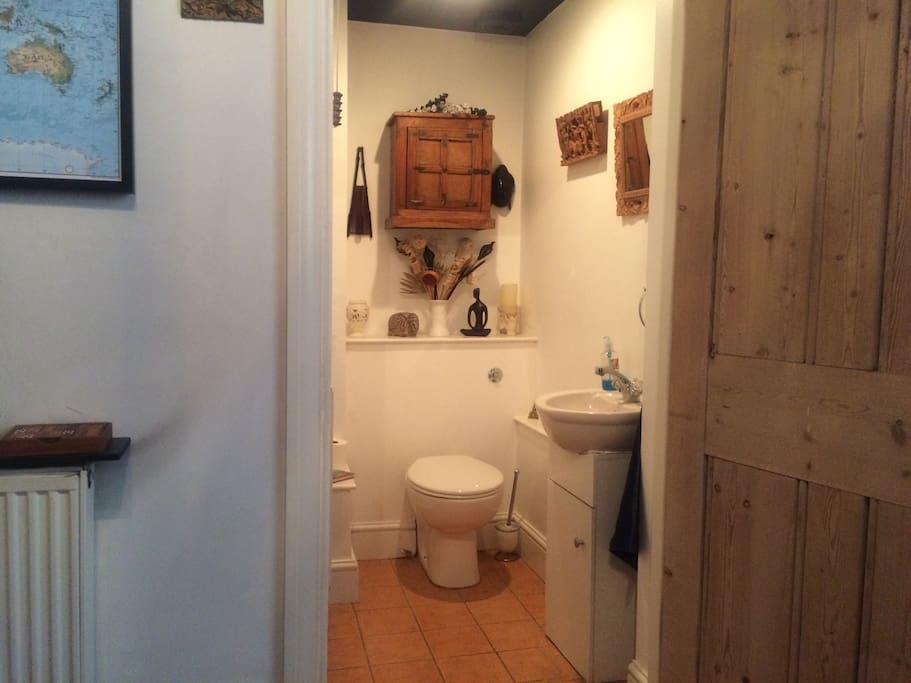 En-suite toilet with sink