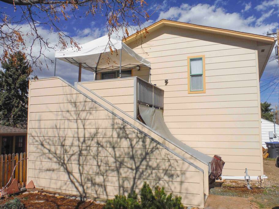 Stair up to deck and private entrance.