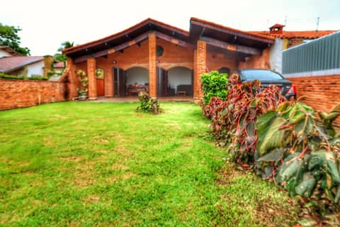 Successful Airbnb property: House in front of the beach, right on the sand! in Itanhaém