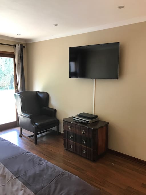 Tv in the room with Netflix, YouTube and DSTV Premium.