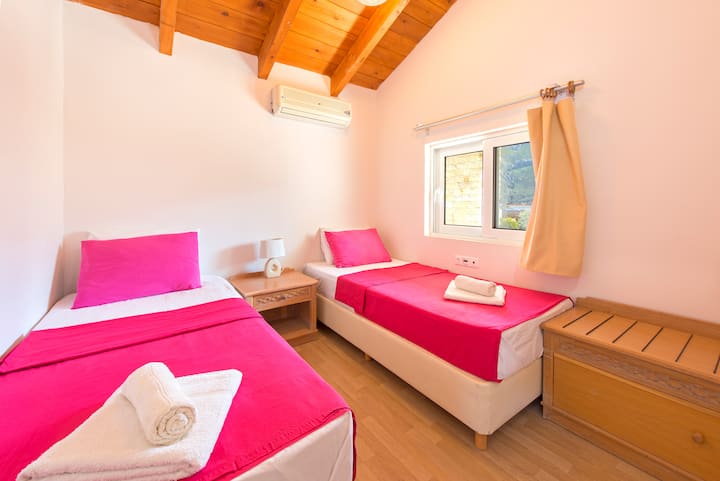 third bedroom with 2 double beds, which can be added together to become a double bed if needed