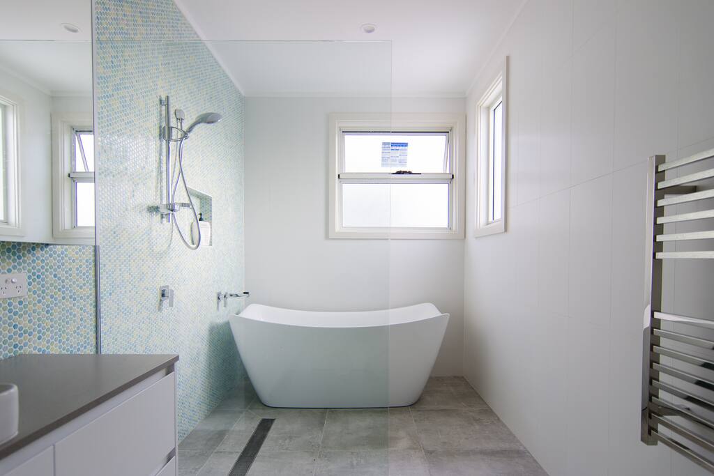 Newly renovated bathroom with large bath