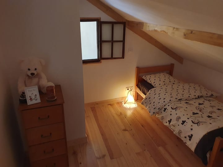 mezzanine,  1st bed, small window "living room view" mountain spirit