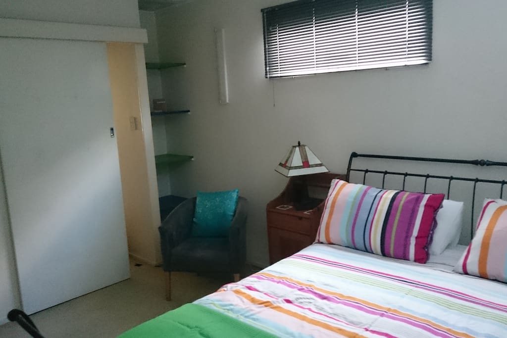 There are shelves and a built in wardrobe