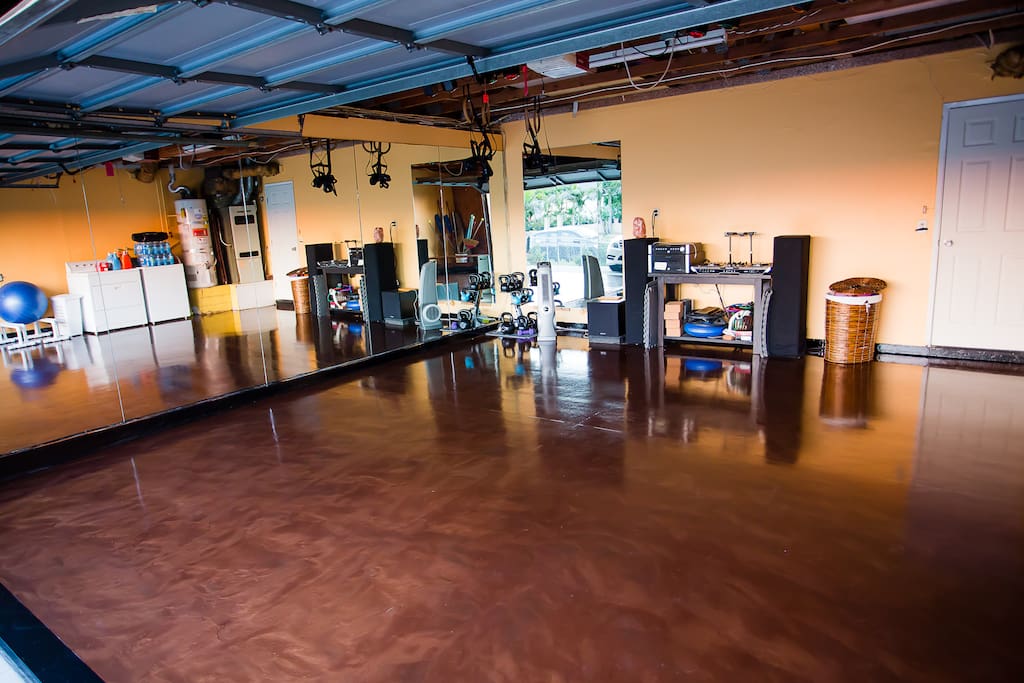 State of the art dance / movement studio. Get in shape, practice Yoga, dance and much more. Features brand new metallic epoxy floors, gymnastic rings, parallette bars, and mirrors wall to wall.