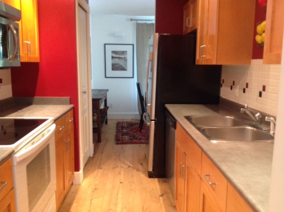 Kitchen with dishwasher and ensuite laundry