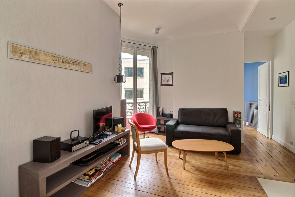 Living room with sofa bed and TV