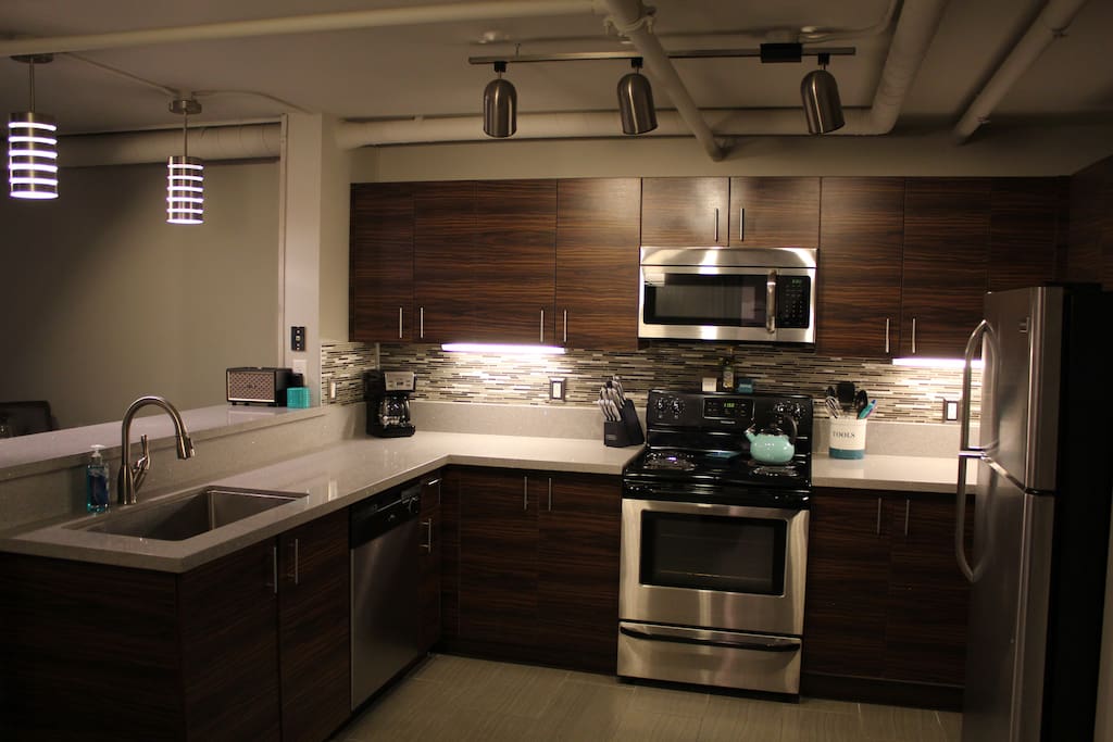 Fully Equipped Kitchen w/ Stainless Steel Appliances and Quartz Countertops