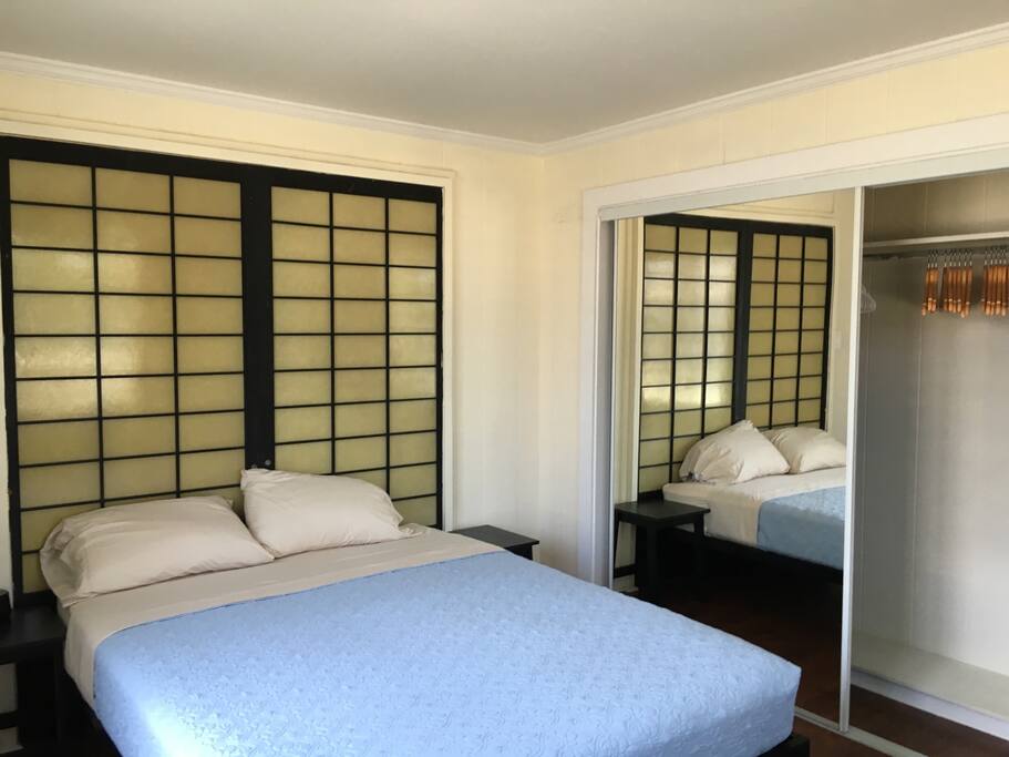 Private bedroom w/ a queen size bed.