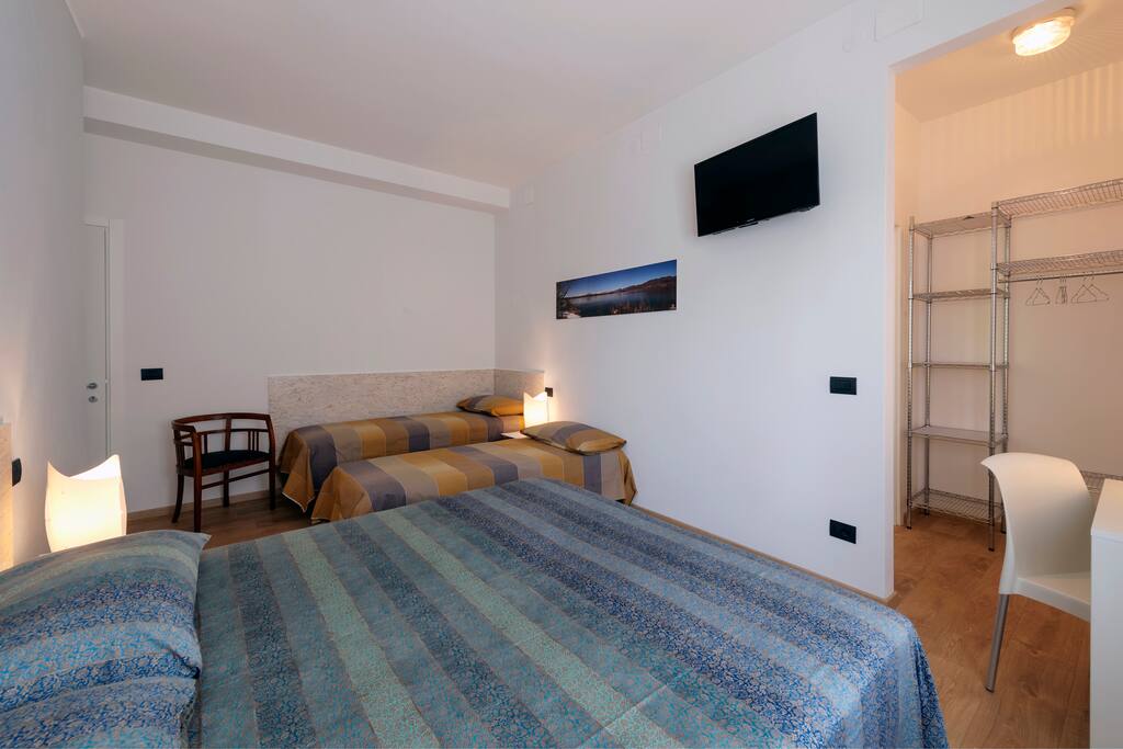 Bedroom, set up with 1 double bed + 2 single beds