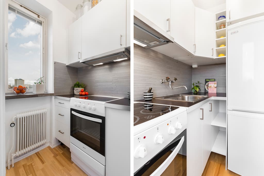 Complete kitchen with oven, fridge, freezer, and microwave oven