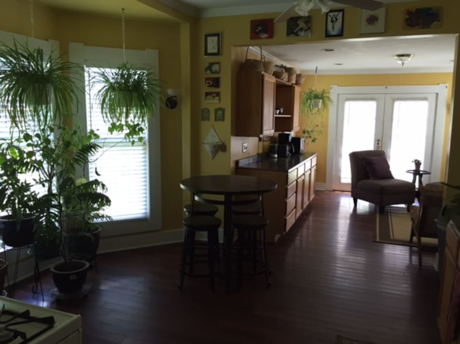 Kitchen is fully equipped with appliances, dishes etc, microwave, coffee pot, and sitting area.