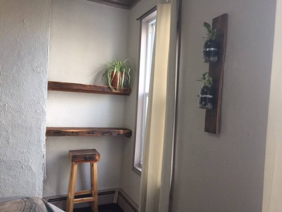 Built in shelving, desk and custom bar stool for a work space