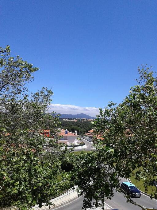 Balcony views towards mountains and sea