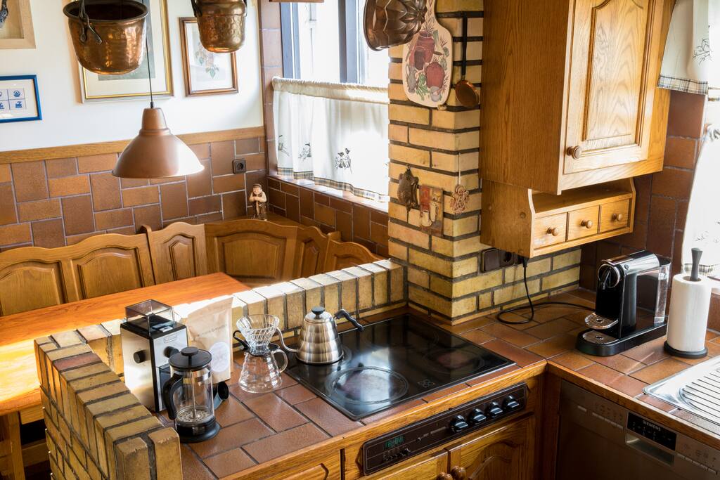 Kitchen area, warm and cozy. Slow brew a cup of coffee or use the Nespresso machine (bring your own favorite coffee)