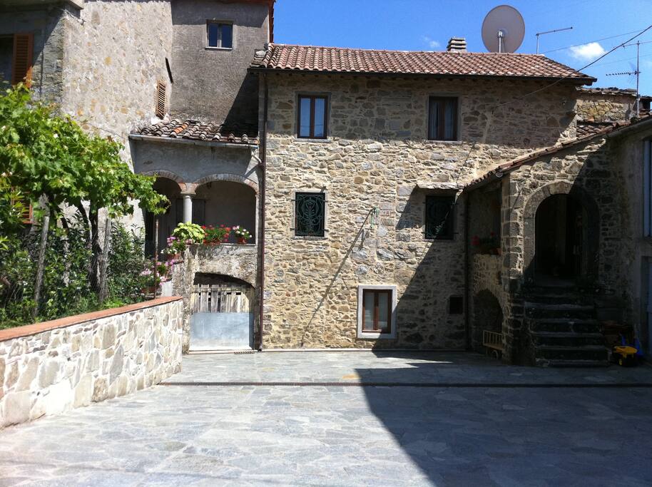 view of the facade of the house, entrance is on the right side.
