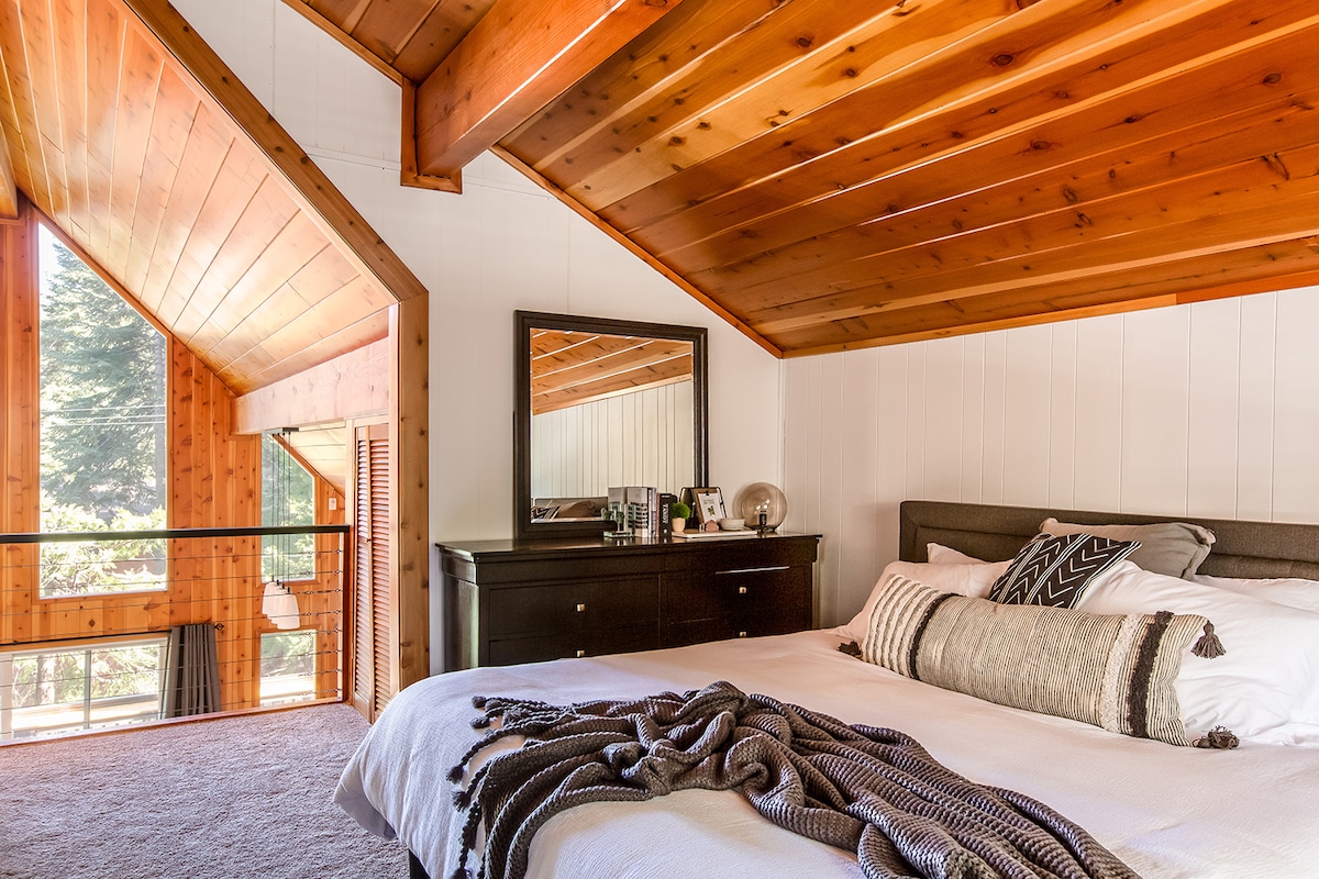 Enjoy incredible morning views from up in the loft with a king bed and a set of twin bunks! 2 Eye masks are always provided to help ensure a restful night's sleep on our premium mattress with soft, luxurious sheets!