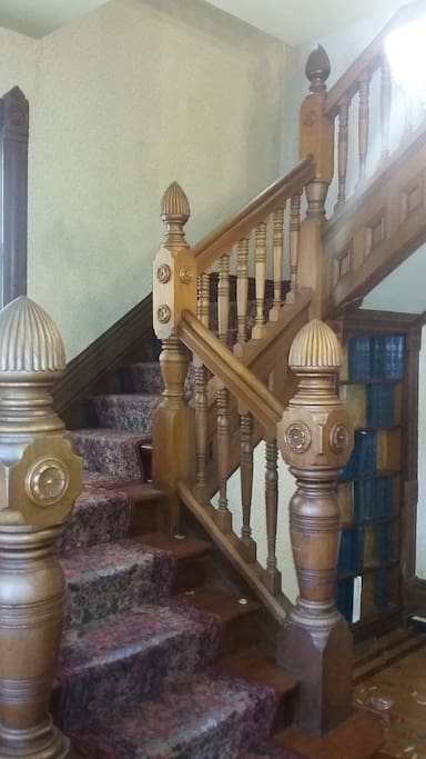 Entrance stairway and secret bookcase