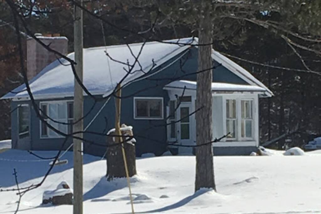 The cabin from the river in January.