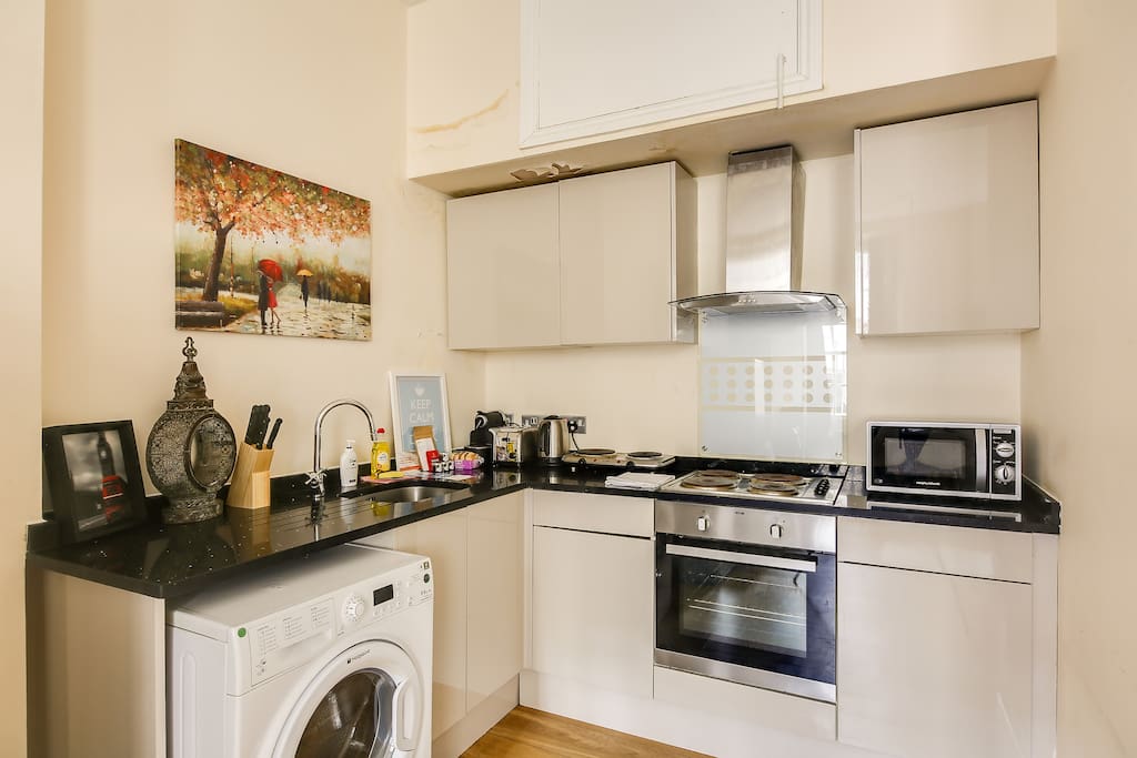 A sleek kitchen with plenty of amenities...