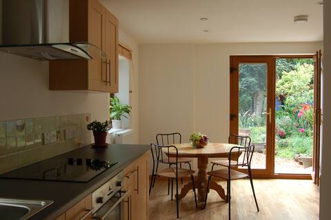Beautiful flat overlooking garden