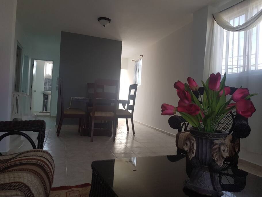 To the left: bedrooms and bathroom/ to the right: kitchen and laundry area.