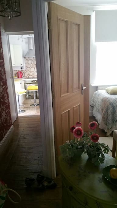Corridor and door to the room and kitchen