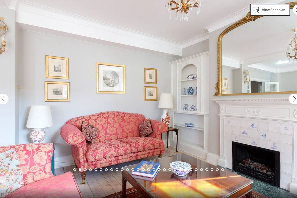 The living room has a working gas fireplace. It is extra cosy in colder months