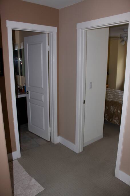 Directly adjacent to the guest bathroom.