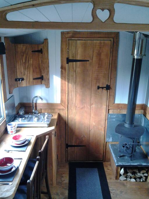 Orthentic Rustic mini kitchen with door to mini wet room