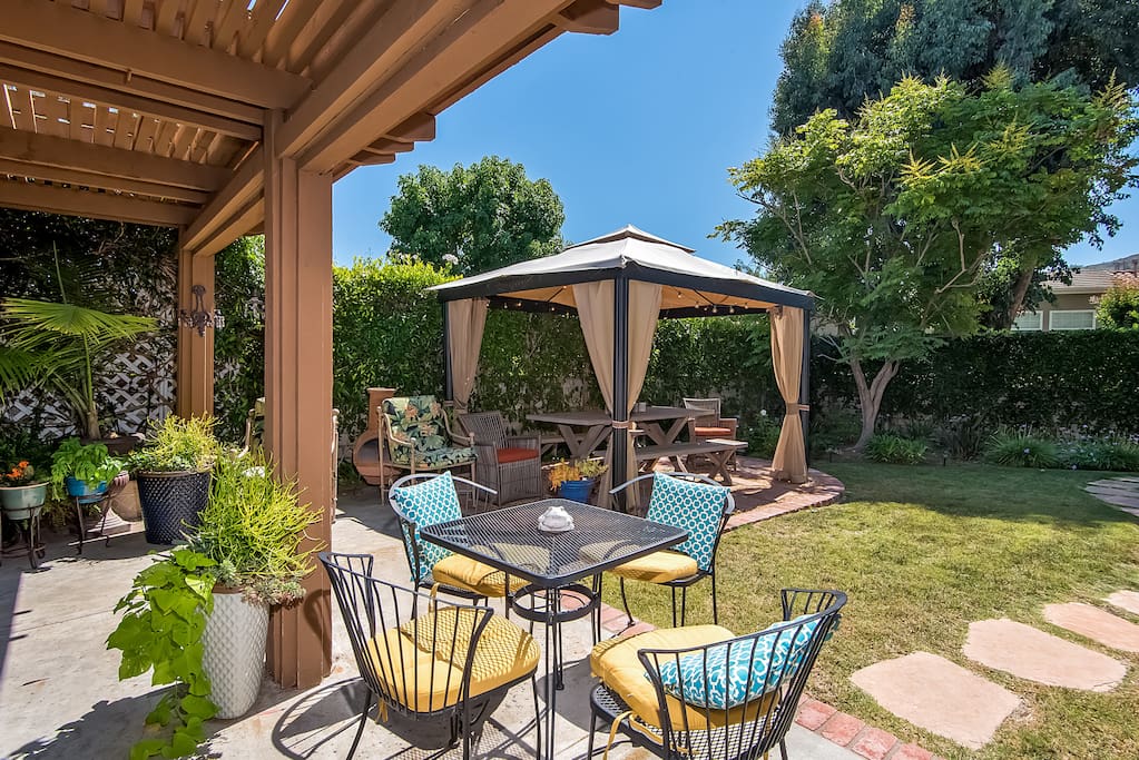 Two outdoor dining areas and an outdoor grill offer lots of dining options