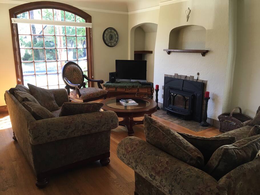Living room is spacious, comfy, TV, WiFi, fireplace.
