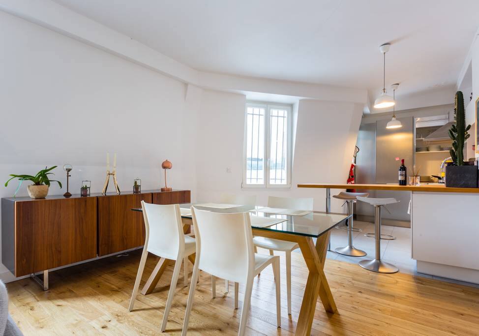 Small dining table (140cm) with two sits at bar. Two more red chairs are not on picture.
